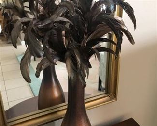 Vase with feathers
