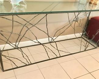 One of a kind metal console with glass top                                 69" x 17 1/2 x 30 1/2"