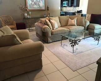 Ashley Couch, Loveseat and matching Ottoman                     Couch: 94" (Length)x 39" (seat width)  x 31" (height of back of couch)x 18 1/2" (Seat height)                                              Love Seat:  55"x39"x30X15"                                                                  Ottoman 40 1/2" x 26" x 19"