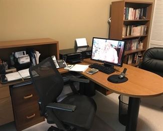 Two piece L-shaped medium oak desk (Piece against wall is 48"Kx24"Dx29"H and return is 30"Wx68"Lx29H) 
Four drawer filing cabinet (36" W x 20" D x 59"H)  (Shown to the left of the lateral files)
Two Matching lateral files medium oak (36"Wx29"Hx"29H each)
Hutch above fiing cabinet smedium oak (44 3/4" W x 24"Dx29"H
Bookcase (36"W x 13" D x67 3/4" H_
Chair 