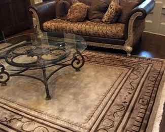 Gorgeous parlor furniture.  Leather & upholstered sofa, beautiful rug with  fabulous glass & metal coffee table. 