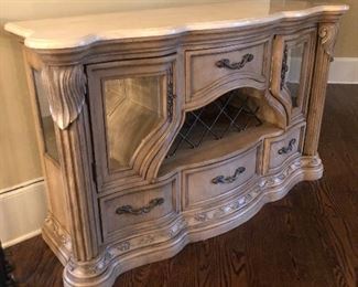 Blond wood console can be used in a dining room, as a library table or to make a hallway warm & inviting.  64.5”L x 19”D x 38”H