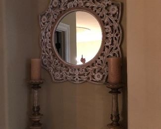 Mirror with floral frame (24” x 24”)  & 16” tall candlesticks complement an architectural niche. 