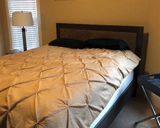 Handsome young man's bedroom complete with artwork, queen mattress set (American Standard w pillow top) & frame, desk, nightstand & lamps.  Qeen Headboard & side rails unavailable. 