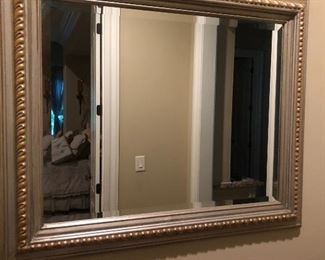 Silver-framed beveled mirror approx 30 x 20".