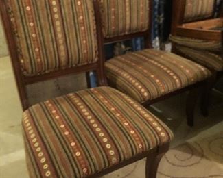 Six upholstered dining chairs. 