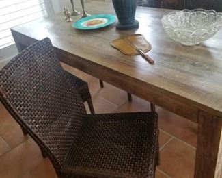beautiful rustic dining room table, woven chairs