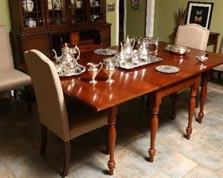 Dropleaf dining table, custom bench-made, in cherry.