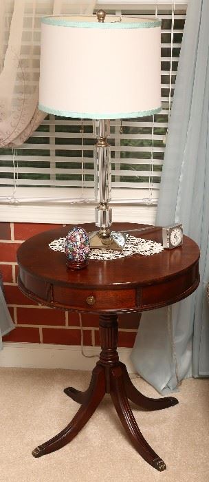 Nice bedside table with crystal lamp.