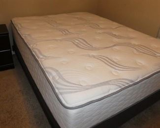 Queen size mattress and end table with drawers