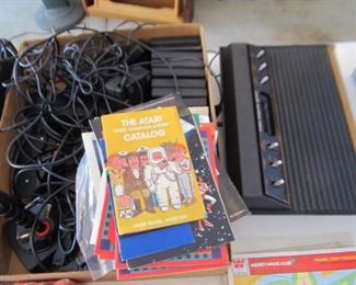 Atari 2600 with controllers and instructions and all parts. Many, many games
