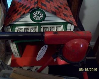 Wyandotte toy cork shooter and tin garden shed