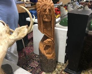 large carved indian tree trunk