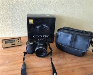 Nikon Camera and Travel Clock