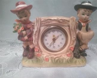 Antique Cowboy/Girl Clock