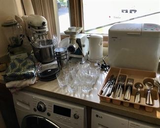 Chef Mate Bread Maker, Kitchen Aid Mixer, `Oster Grinder,  Stainless Steel Flatware Set,  Vintage Aprons,  and more...