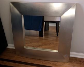 Silver framed wall mirror