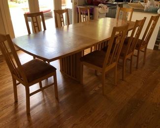 Kitchen table (show with leaf) and 8 chairs
