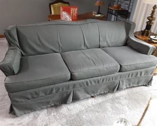 Vintage couch with fitted cover