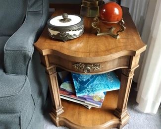 Vintage end table.  Decorative items, table side books