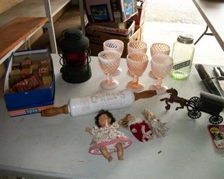 Antique Wooden Blocks, Fenton Pink Opalescent Hobnail Glasses, Depression Glass Green Canister, Milk Glass Advertising Rolling Pin, Railroad Lantern, Knives