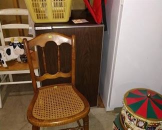 Basement: Cane Chair, Small Refrigerator, Freezer