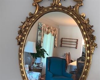Oval-federal style Gold toned mirror