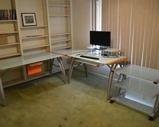 Nice tempered glass desk with matching printer desk. Pullout keyboard and pullout file holder. Can also be used as two separate desks.