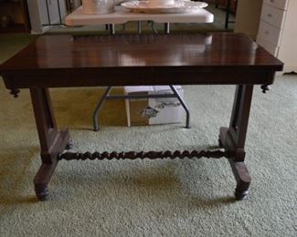 Nice table, not sure how old, but all solid hardwood. 