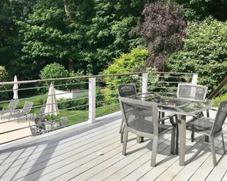 Several Tables and Chairs Coast Collection by Brown Jordan