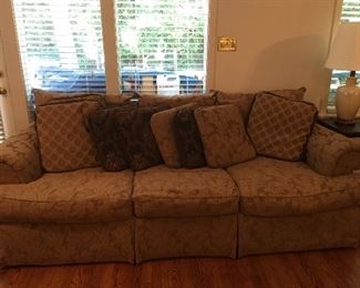 Sorry for the lighting, you need to see this sofa!  Beautiful tan colors with jacquard leaf print.