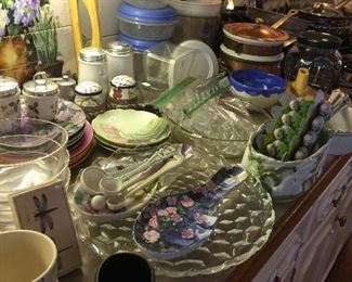Kitchen is full of serving pieces and unique china.