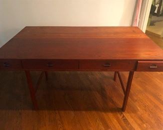 Lookit! Cheryl says it can also be a dining table. But I say like hell anyone's putting food near my authentic Dansk flip desk!