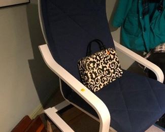 lookit that vintage train case on that cool chair