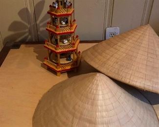 Dutch whirly gig. Hats for wearing in the rice paddy