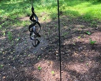 Spinning metal lawn sculpture