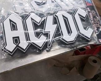 5 AcDc Signs and 1 Journey Sign