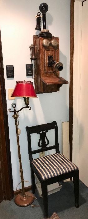 Antique phones, floor lamp, side chair