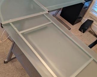 Corner glass and silver metal computer desk. 3 pieces, so it will fit in any office space