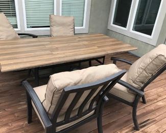 Patio table with 6 chairs and umbrella stand