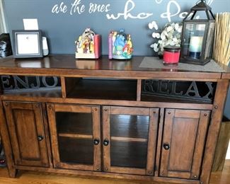 Rustic Media cabinet constructed in solid hardwood with a distressed age look.