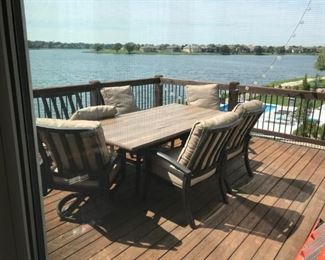 Patio table with 6 chairs and umbrella stand