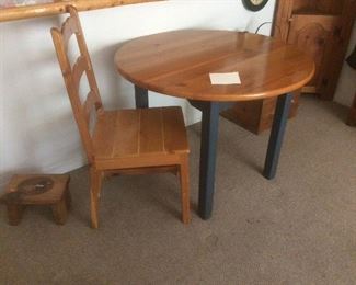 Wood table and one chair.