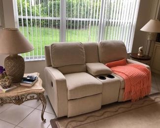 Almost new electric reclining loveseat, smoke free, stain free and pet free home.   $300