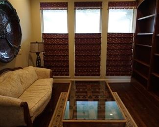 Study Room with Large Couch. Table and Rug. Curtains