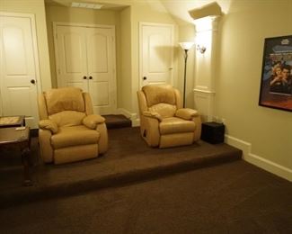 Media Room Furniture. Recliner Chairs. Wooden Table. Metal Lamp. Top Gun Poster