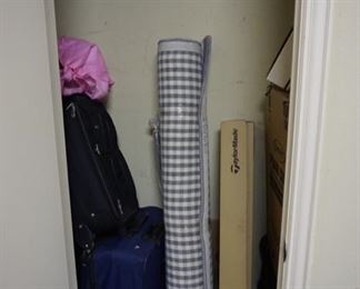 Suit Cases and Rug.
