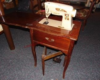 310 singer sewing machine