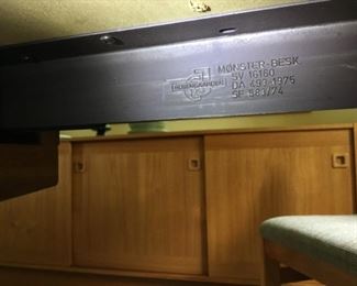 The Rosengaarden engraving on the metal sliders of the table.