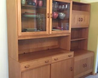 Domino Mobler China Cabinet is approx. 48 in L x 20in D x 72in H. Top hutch of china cabinet is approx 15.75 in D. Bookcase measures approx 31 in. L x 20 in. D x 72 in. H. (Top shelf measures approx 11.5 in. D. )